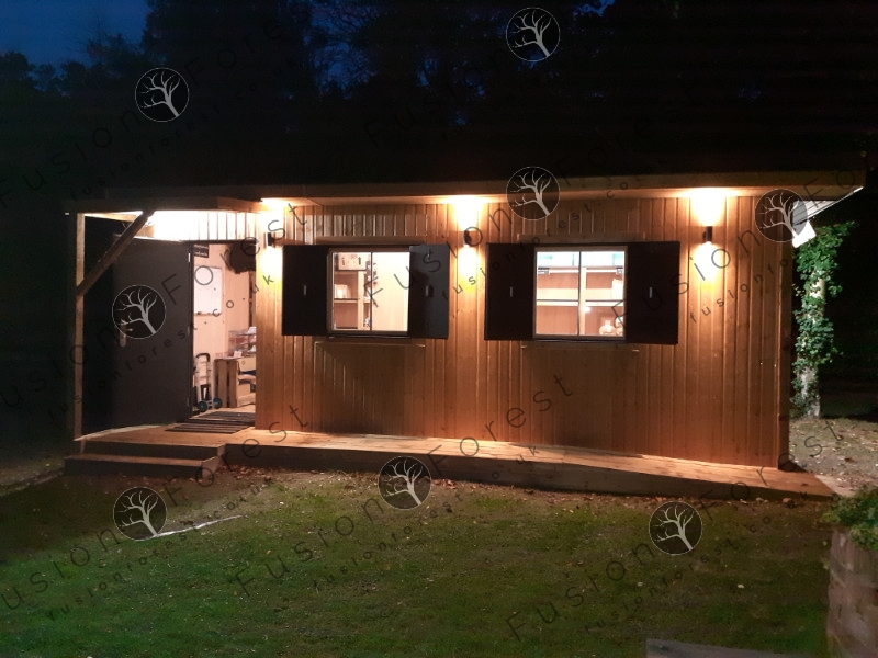 Container office exterior at night - serving Ashford