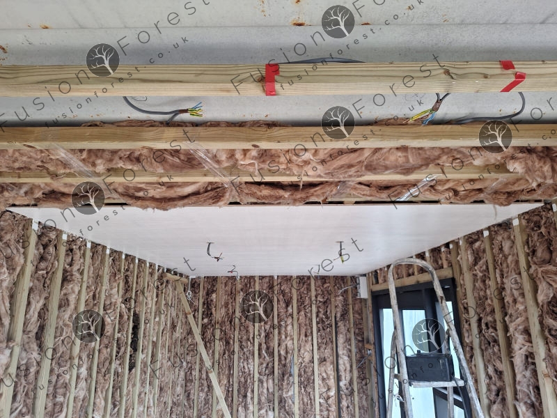 Internal insulation detail in shipping container conversion