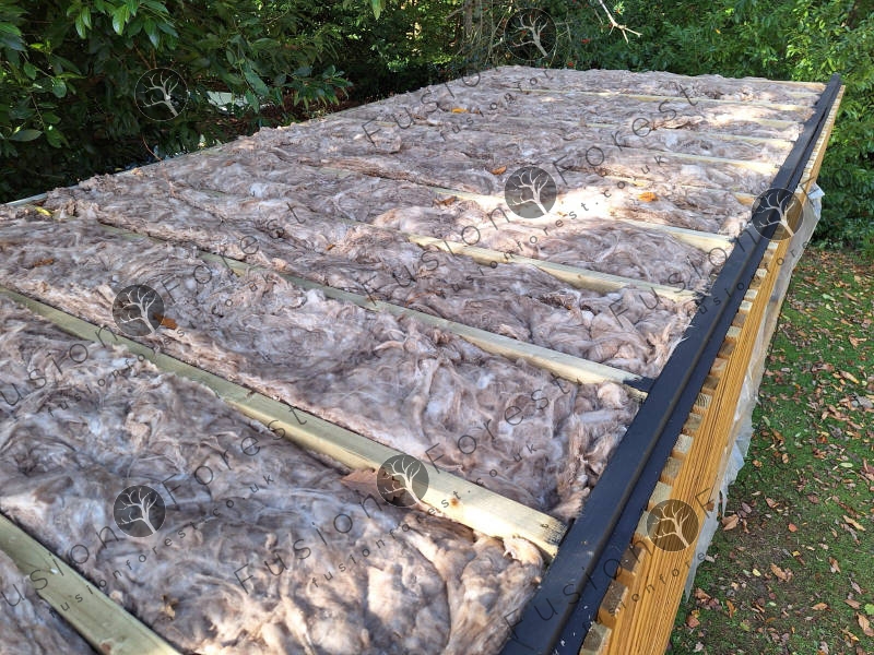 Roof insulation detail in shipping container conversion
